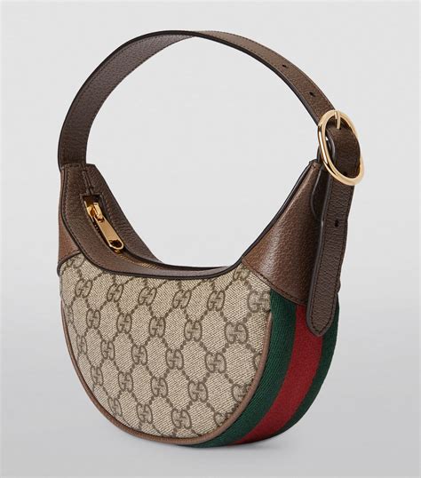 gucci handbag with lion head|Gucci ophidia mini bag.